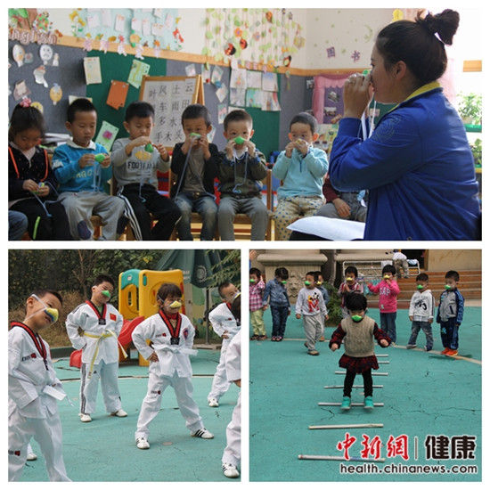 上图为老师教学生佩戴防霾鼻罩下图为学生在室外活动 上图为老师教学生佩戴防霾鼻罩下图为学生在室外活动